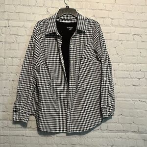 Kim Rogers Checkered jacket with black undershirt